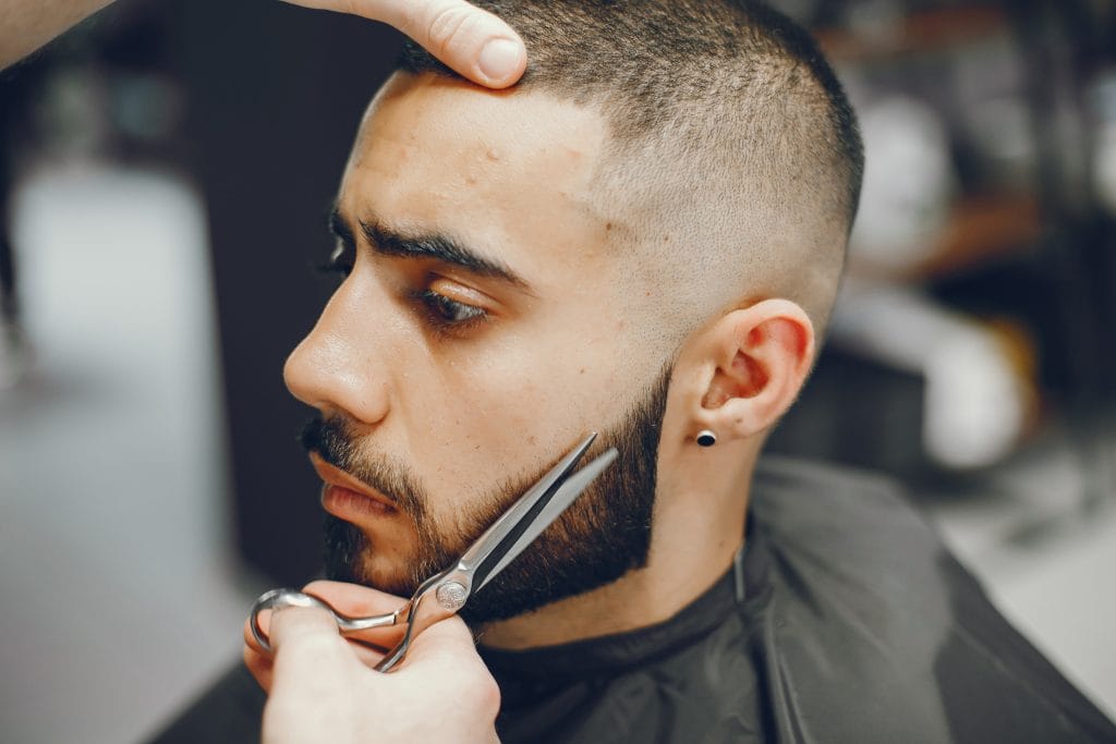 40 Perfect Low Taper Fade Haircuts For Men 26 A bold taper fade with a buzz cut, featuring a clean taper on the sides and back that blends into a short, evenly buzzed top for a sharp and low-maintenance look